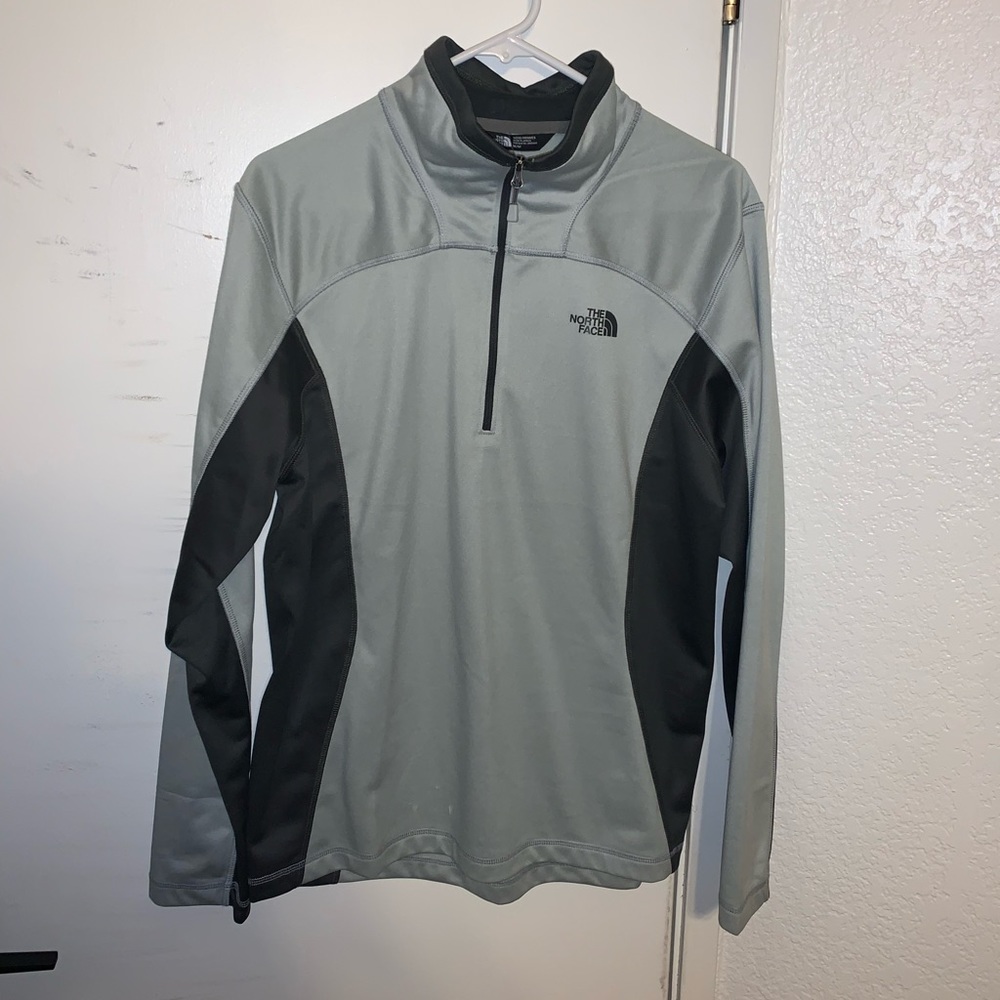 Light and dark gray North Face quarter zip. Size medium.